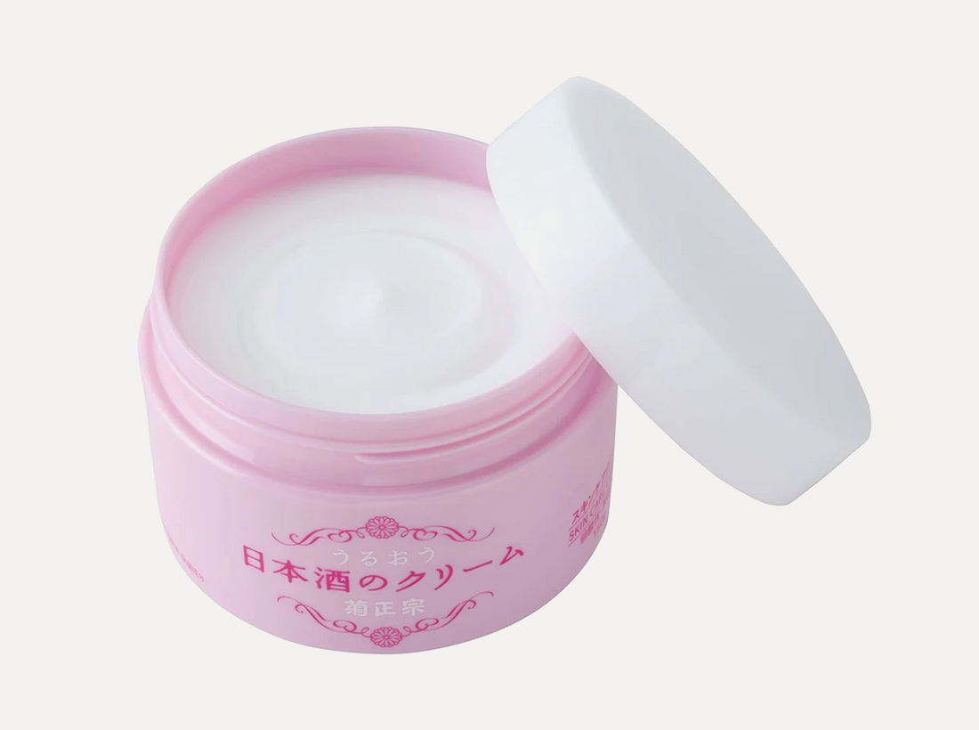 Pink jar of cream with Japanese text on a white background, Kikumasamune Skin Cream 150g