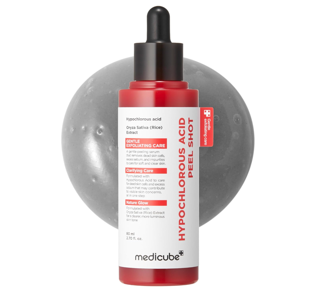 A bottle of medicube Hypochlorous Acid Peel Shot skincare product, featuring a red bottle with a black dropper cap and a white label with red text, set against a gray textured background, Medicube Hypochlorous Acid Peel Shot 80ml