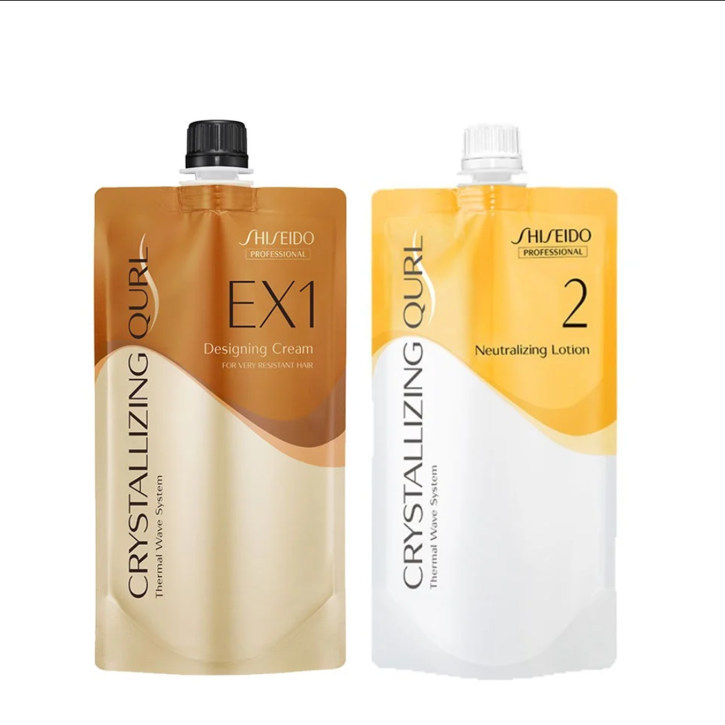 Two Shiseido Professional Crystallizing Curl hair extension pouches, EX1 Designing Cream in brown and EX2 Neutralizing Lotion in yellow and white, shown on a white background. Shiseido Professional Crystallizing Qurl EX1 Designing Cream + Neutralizing Lotion Professional Digital Perm Set 400g + 400ml for Extremely Resistant Hair