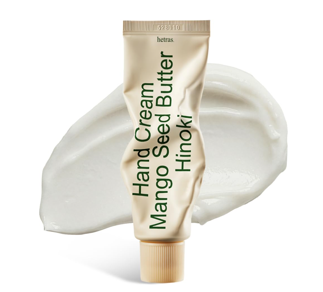Hand cream tube labeled 'Mango Seed Butter Hinoki' with cream swatch on a white background, Hetras Hand Cream Mango Seed Butter Hinoki 50ml