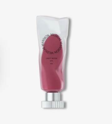 Lip balm tube with pink shade on a white background, Muzigae Mansion Objet Water 005 Diva