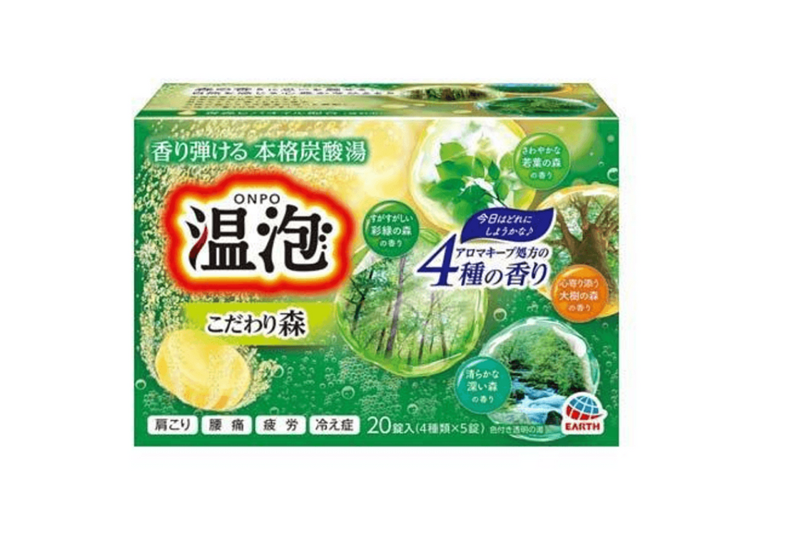 A box of ONPO Onodairin green tea scent bath salts, featuring a green and white design with illustrations of tea leaves, bubbles, and a forest scene, on a plain white background. Earth Onpo Kodawari Mori Carbonated Bath Additive 20pcs