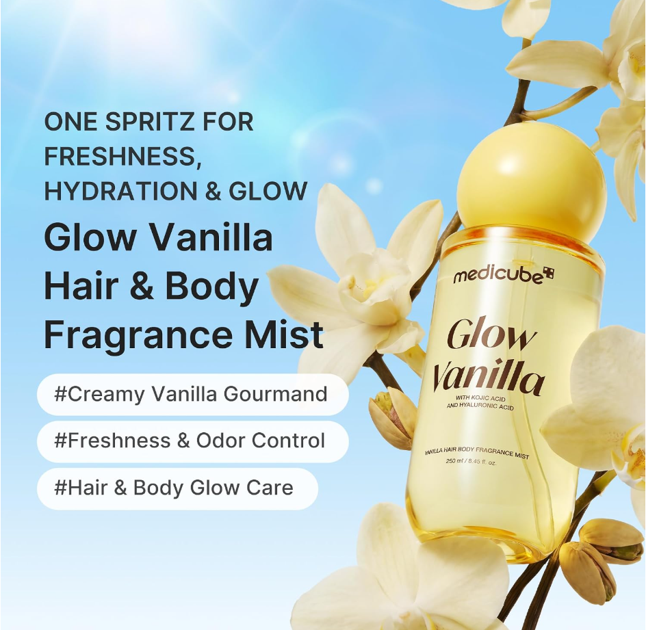 Medicube Glow Vanilla Hair & Body Fragrance Mist bottle with a yellow cap, surrounded by white orchids on a blue gradient background with promotional text. Medicube Glow Vanilla Hair Body Fragrance Mist 100ml