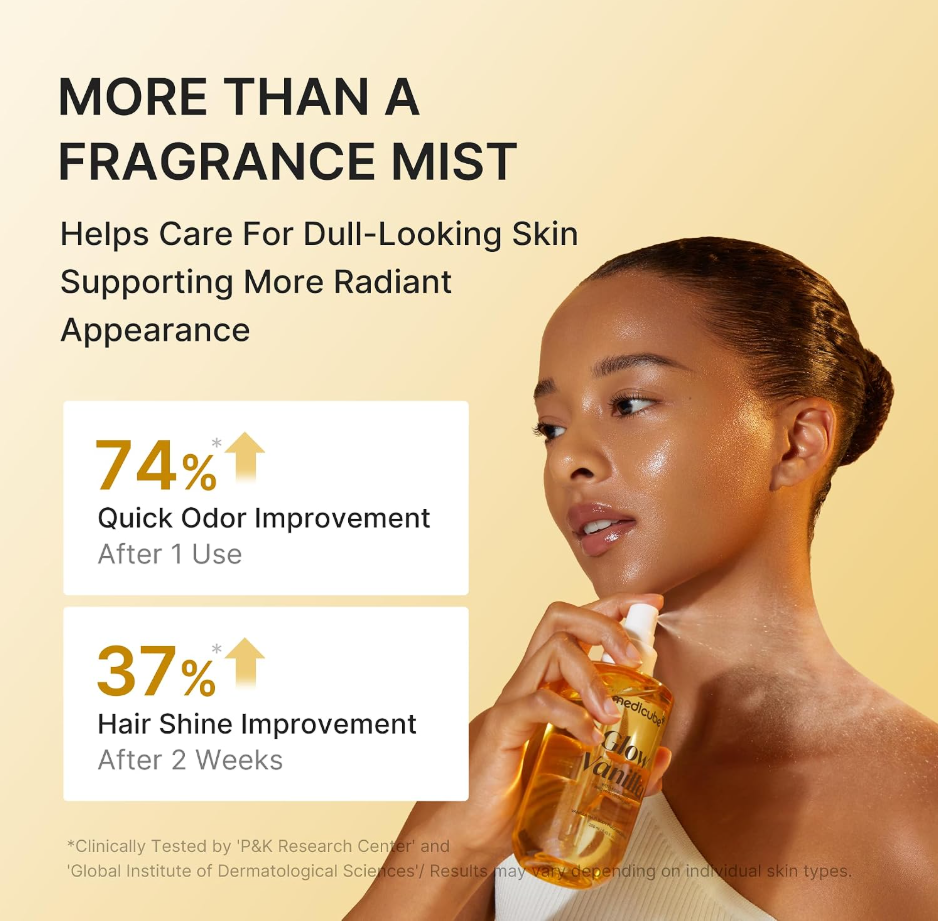 A promotional graphic for a hair care fragrance mist. A woman with styled hair holds a clear spray bottle containing amber liquid. Medicube Glow Vanilla Hair Body Fragrance Mist 100ml