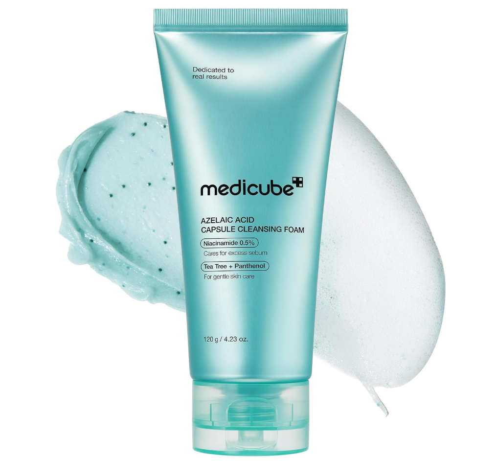 A tube of Medicube Azelaic Acid Capsule Cleansing Foam in a light aqua color, shown with a dollop of the foaming cleanser and a large bubble behind it on a white background. Medicube Azelaic Acid Capsule Cleansing Foam 120g