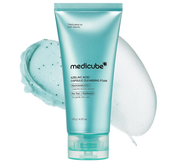 A tube of Medicube Azelaic Acid Capsule Cleansing Foam in a light aqua color, shown with a dollop of the foaming cleanser and a large bubble behind it on a white background. Medicube Azelaic Acid Capsule Cleansing Foam 120g
