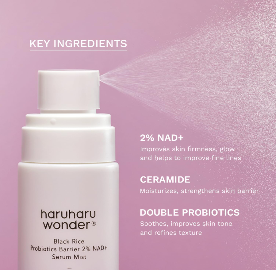 A white Haruharu Wonder Black Rice Probiotics Barrier 2% NAD+ Serum Mist bottle shown against a soft pink background, with a mist spray extending to the right. White text highlights key ingredients: 2% NAD+, Ceramide, and Double Probiotics. Haruharu Wonder Black Rice Probiotics Barrier 2% NAD+ Serum Mist 80ml
