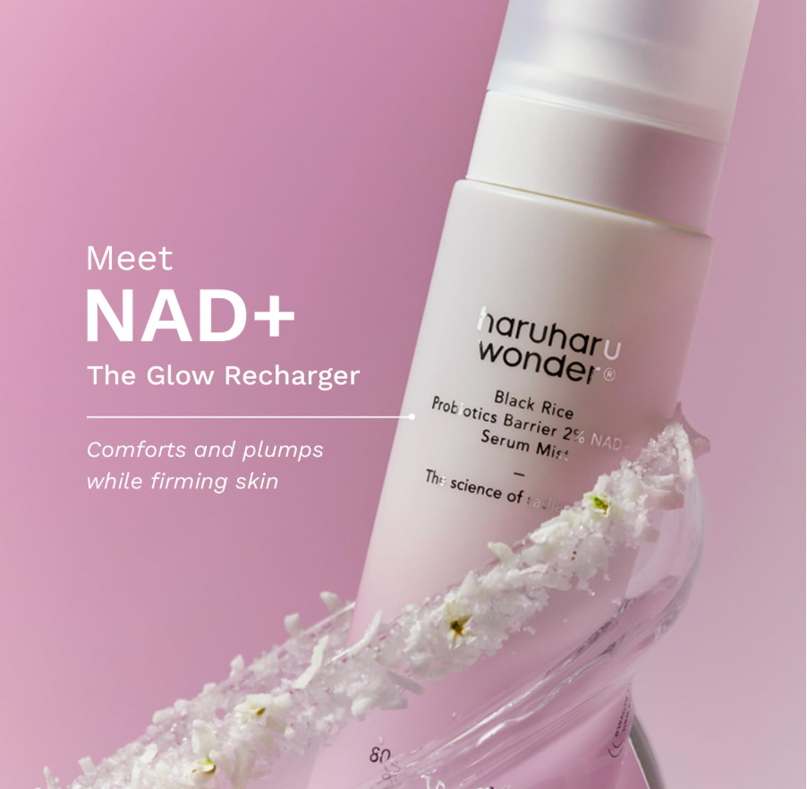Haruharu wonder NAD+ serum mist bottle on a pink background with text about skincare benefits. Haruharu Wonder Black Rice Probiotics Barrier 2% NAD+ Serum Mist 80ml