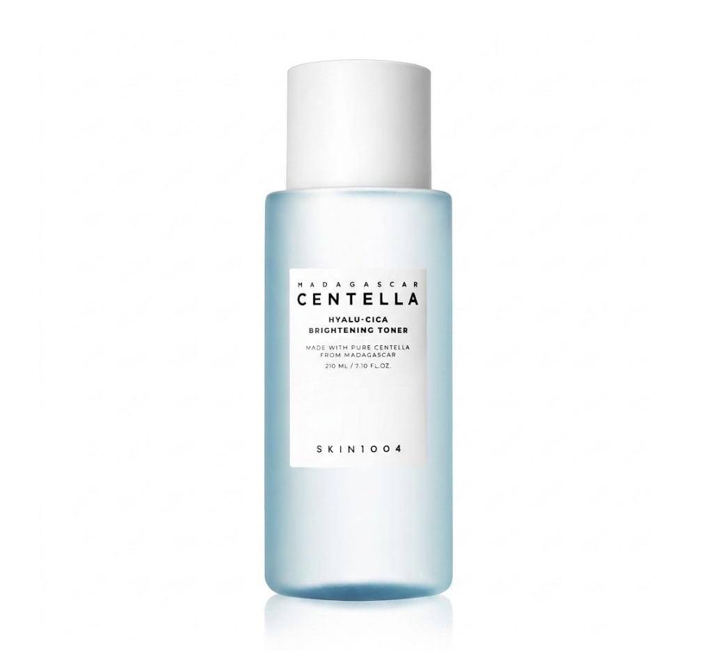 A bottle of SKIN1004 Matadgaecar Centella Hyalu Cica Brightening Toner with a white cap and a light blue translucent bottle, shown on a clean white background. Skin1004 Madagascar Centella Hyalu-Cica Brightening Toner 210ml