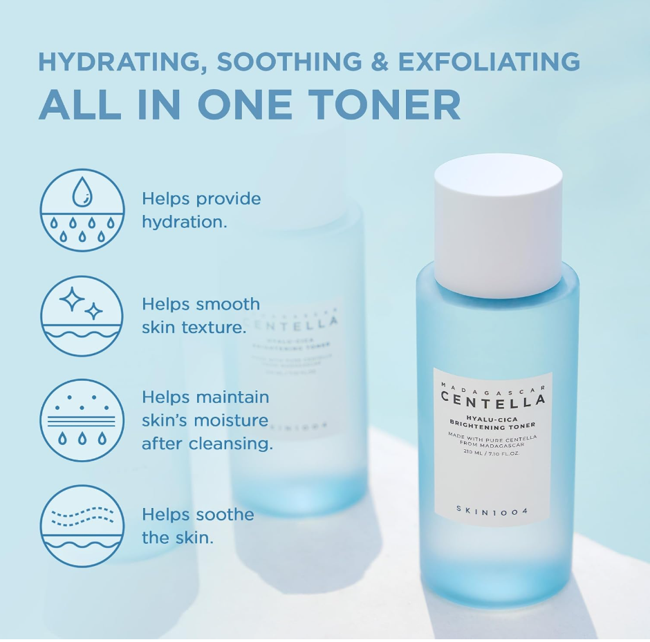 A skincare product advertisement for SKIN1004 Centella Hyaluelastic Toner. The image features a light blue bottle with a white cap on the right, alongside a blurred duplicate bottle in the background. Skin1004 Madagascar Centella Hyalu-Cica Brightening Toner 210ml