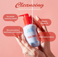 Tocobo cleansing oil bottle held by a hand with product features highlighted on a pink background, TOCOBO Calamine Pore Control Cleansing Oil 200ml