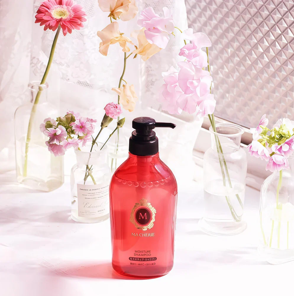 Red shampoo bottle with pump labeled 'Ma Cherie' on a white background, Shiseido Ma Cherie Moisture Shampoo EX