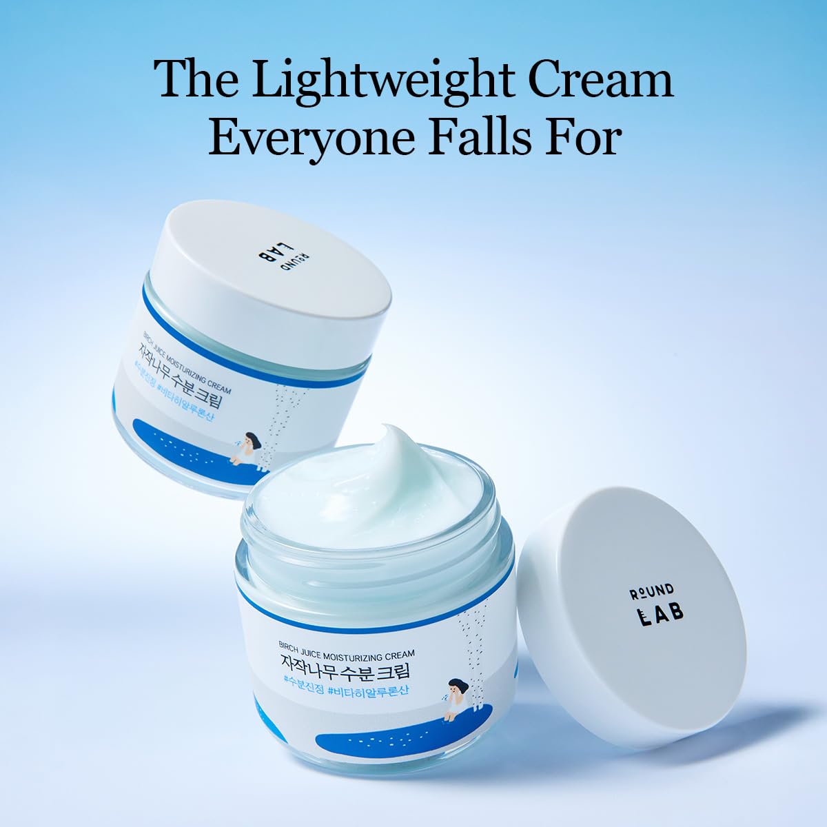 Two jars of cream with a blue background and text about the cream, Round lab Birch Juice Moisturizing Cream 80ml