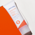 Aestura Derma UV50+ sunscreen tube on a white background, Aestura Derma UV 365 Vita-C Radiance Sunscreen 50+ 40ml