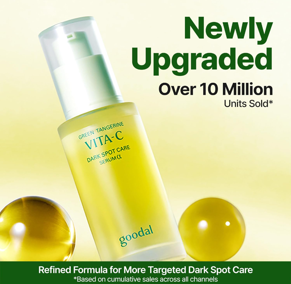 A bottle of Goodal Vita-C Green Tangerine Dark Spot Care Serum G, featuring a frosted glass bottle with a pale green pump, set against a white background with a translucent yellow-green gel smear behind it. Goodal Green Tangerine Vita-C Dark Spot Care Serum Alpha 40ml