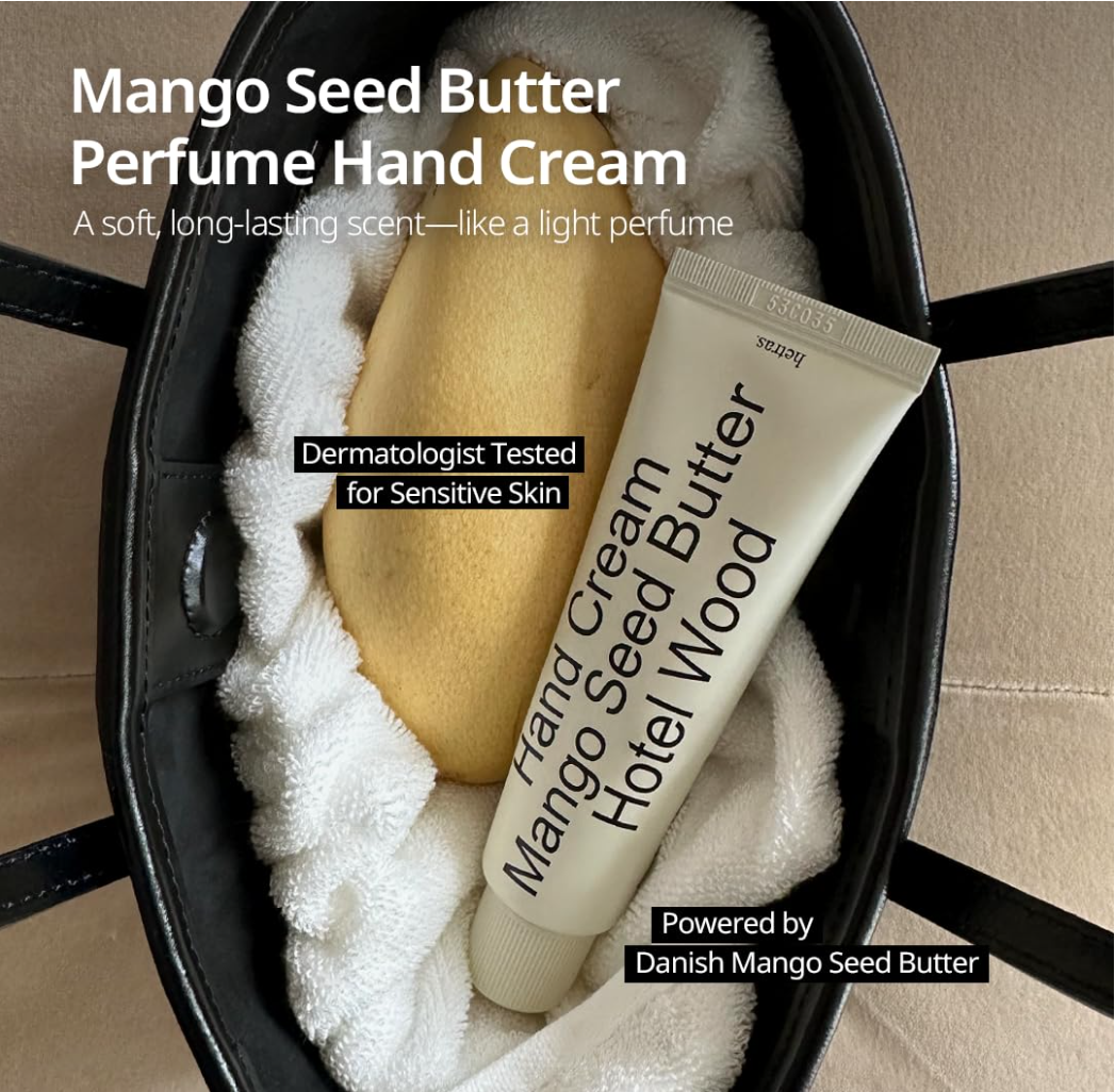 Hand cream tube labeled 'Mango Seed Butter' with a swatch of cream on a white background, Hetras Hand Cream Mango Seed Butter Hotel Wood 50ml