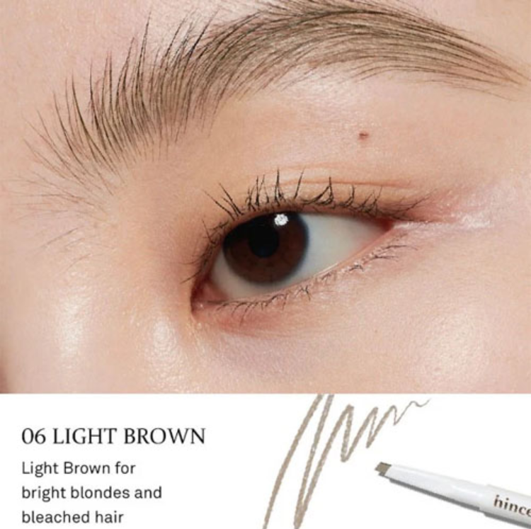 Close-up of an eye with light brown eyebrow pencil and product name on a white background, Hince Signature Brow Pencil P006 Light Brown