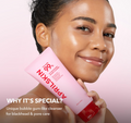 Woman holding a pink skincare product with text about its special qualities on a light pink background, April Skin TXA Niacinamide 99 Deep Cleanser 120g