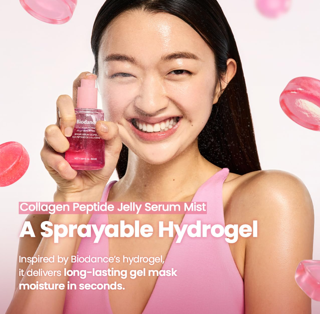 A smiling woman in a pink top holds up a pink bottle of Biodance Collagen Peptide Jelly Serum Mist against a white background with floating pink lip graphics and promotional text, Biodance Collagen Peptide Jelly Serum Mist 50ml