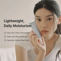 Woman holding a skincare product with text about a lightweight daily moisturizer, Dr.althea Aqua Marine Watery Cream 50ml