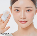 Person holding a COSRX product against a plain background, COSRX Low pH Niacinamide Micellar Cleansing Water 400ml