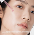 Close-up of a woman's face with a cosmetic product being applied to her skin, Arencia Red Smoothie Serum 8 30ml