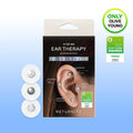 Packaged ear therapy acupressure patch set by RETURNITY, featuring three white circular patches with silver and clear crystal elements on the left, and the product box in the center. The box displays an illustration of an ear with crystals inserted and award badges on the right.